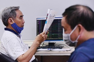 Thị trường 99Kl99 link đăng nhập luôn rất nhạy cảm với thông tin. Ảnh: Dũng Minh.