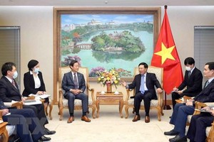 Phó Thủ tướng Thường trực Kl993 ưu đãi thưởng hấp dẫn Phạm Bình Minh tiếp ông Junichi Yamada. (Ảnh: Phạm Kiên/TTXVN).