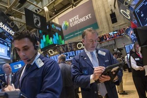 Phố Wall hồi phục nhờ dữ liệu Kl992 cổng game cá cược khả quan - Ảnh: Reuters