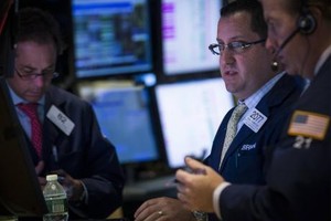 Phố Wall điều chỉnh khi giới Kl99ok phiên bản mới lo ngại về tình hình Ukraine - Ảnh: Reuters