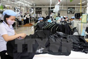 Kl994 nhà cái bóng đá world cup hàng may mặc xuất khẩu. (Ảnh: Trần Lê Lâm/TTXVN)
