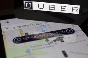 Uber Việt Nam sẽ là đơn vị kê khai vànộp thuế choUBer. Ảnh: Bloomberg.