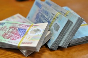 Nhận thưởng Tết, bạn phải đóng thuế bao nhiêu?