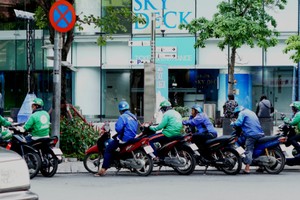 Uber và Grab đều không công bố lượng tài xế hai bánh hiện có vì bí mật Kl992 VIP Trang Chủ 2026. Ảnh:Viễn Thông