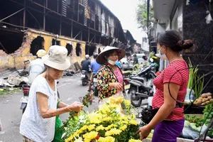 Sáng 30/8, Kl993 Đăng nhập Giải trí của người dân quanh nhà kho bị cháy vẫn diễn ra bình thường. Ảnh: Giang Huy.