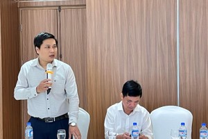 TS. Trần Minh Sơn, Trưởng Văn phòng Chương trình hỗ trợ pháp lý liên ngành cho Kl991.com World Cup 2026 Chính Thức nhỏ và vừa, Bộ Tư pháp trình bày tại Hội thảo (ảnh: M.M)