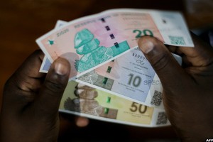 Zimbabwe quay lại chế độ bản vị vàng trong cuộc chiến chống siêu Kl999.com Đường Link Mới Nhất