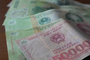 Phá hoại, hủy hoại tiền Việt Nam trái Kl992 Tham Gia Ngay sẽ bị phạt tiền