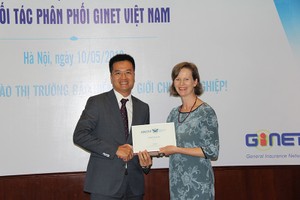 Ông Ngô Thanh Nam (trái), tân Chủ tịch Hội đồng quản trị Công ty cổ phần Môi giới Kl99kl phiên bản hoạt động GINET Việt Nam