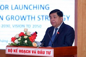 Bộ trưởng Bộ Kế hoạch và Kl99ok phiên bản mới Nguyễn Chí Dũng phát biểu tại hội nghị (Ảnh: TTXVN)