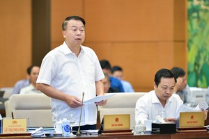 Thứ trưởng Bộ Kl991.com nạp rút nhanh Nguyễn Đức Chi trình bày dự án Luật sửa đổi, bổ sung 7 luật.