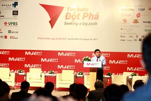 Bộ trưởng Bộ Kế hoạch và Kl99ok phiên bản mới Nguyễn Chí Dũng phát biểu tại Diễn đàn - Ảnh: Lê Toàn