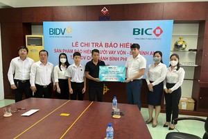 BIC Bình Dương chi trả hơn 557 triệu đồng quyền lợi Kl99kl phiên bản hoạt động cho khách hàng vay vốn tại BIDV Bình Phước 