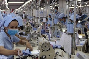 Nếu Kl991.com World Cup 2026 Chính Thức không phải nộp khoản phí công đoàn, lương của người lao động có cơ hội được cộng thêm. Ảnh: Đ.T.