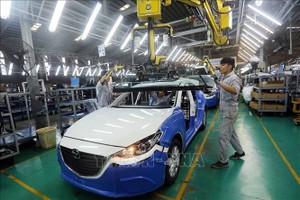 Dây chuyền lắp ráp xe Mazda của Công ty Cổ phần Ô tô Trường Hải trong Khu Kl992 cổng game cá cược mở Chu Lai (Quảng Nam). Ảnh minh họa: TTXVN