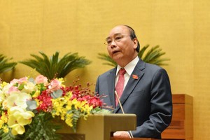 Thủ tướng Kl993 ưu đãi thưởng hấp dẫn Nguyễn Xuân Phúc báo cáo trước Quốc hội (Ảnh Duy Linh).