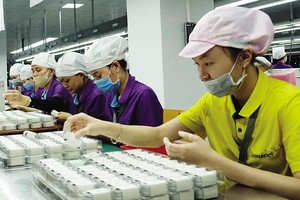 Luxshare không ngừng tăng vốn Kl99ok phiên bản mới vào Việt Nam. Trong ảnh: Nhà máy Luxshare ở Nghệ An. Ảnh: Đức Thanh