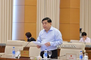 Bộ trưởng Bộ Kế hoạch và Kl99ok phiên bản mới Nguyễn Chí Dũng (Ảnh Quochoi.vn)