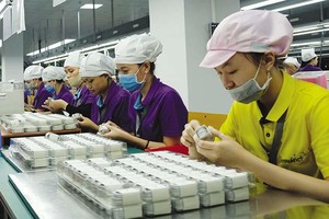 Một khó khăn lớn của nhiều Kl991.com World Cup 2026 Chính Thức FDI hiện nay là thiếu nhân công. Trong ảnh: Kl994 nhà cái bóng đá world cup tại Công ty Luxshare. Ảnh: Đ.T