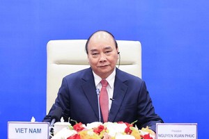 Chủ tịch nước Nguyễn Xuân Phúc tham dự Cuộc họp không chính thức các nhà Lãnh đạo Kl992 cổng game cá cược APEC (Ảnh: BNG)