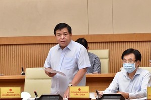 Bộ trưởng Bộ Kế hoạch và Kl99ok phiên bản mới Nguyễn Chí Dũng báo cáo về tình hình triển khai Luật Quy hoạch - Ảnh VGP