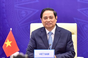 Thủ tướng Phạm Minh Chính dẫn đầu Đoàn Việt Nam tham dự Hội nghị (Ảnh: Nhật Bắc)