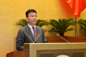 Bộ trưởng Bộ Tư pháp Lê Thành Long báo cáo về công tác thi hành án năm 2021.
