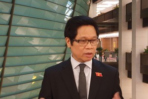 Ông Vũ Tiến Lộc, đại biểu Quốc hội Hà Nội trao đổi với phóng viên Báo Kl99ok phiên bản mới bên lề phiên họp sáng 7/1/2021.