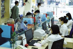 Tính đến cuối năm 2021, dư nợ cho vay nền Kl992 cổng game cá cược của BIDV đạt 1,33 triệu tỷ đồng. Ảnh: Đức Thanh