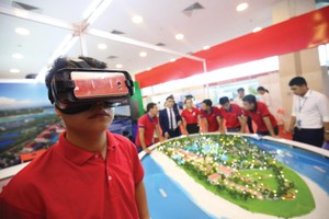 Chuyển đổi số trong giao dịch Web Tổng Nhà Cái 99Kl99 Giải Trí Bậc Nhất đã trở thành xu hướng. Ảnh: Dũng Minh