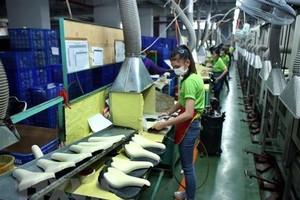 Dây chuyền Kl994 nhà cái bóng đá world cup yên xe đạp xuất khẩu tại Công ty Pro Active Global Việt Nam, vốn Kl99ok phiên bản mới của Đài Loan (Trung Quốc) tại Khu công nghiệp Đại Năng, Bình Dương. (Ảnh: Danh Lam/TTXVN)