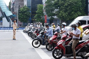 Việc bỏ Kl99kl phiên bản hoạt động bắt buộc xe máy khó thực hiện trong một sớm, một chiều. Ảnh: Dũng Minh