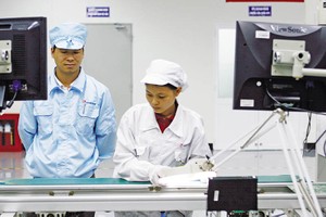Dây chuyền Kl994 nhà cái bóng đá world cup của Foxconn tại Bắc Ninh. Ảnh: Đức Thanh