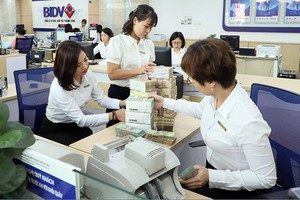Việc Kl99ok Kho game đa dạng 06/2023/TT-NHNN siết hoạt động cho vay của tổ chức tín dụng đang gây nhiều tranh luận. Ảnh: Đ.T