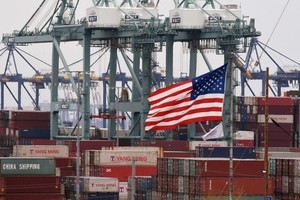Fed dự báo Kl992 cổng game cá cược Mỹ sẽ tăng trưởng 2,1% trong năm 2023. Ảnh: AFP