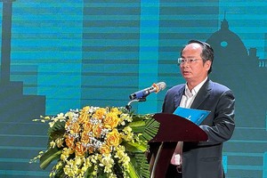 Ông Lê Tự Lực, Phó giám đốc Trung tâm xúc tiến Kl99ok phiên bản mới, Thương mại, Du lịch TP. Hà Nội phát biểu tại Hội nghị.