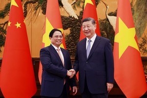Thủ tướng Phạm Minh Chính hội kiến Tổng Bí thư Ban Chấp hành Trung ương Đảng Cộng sản Trung Quốc, Chủ tịch nước Cộng hòa nhân dân Trung Hoa Tập Cận Bình. (Ảnh: Nhật Bắc)