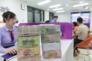 Tăng trưởng tín dụng chậm không phải vì KL99 là cổng game giải trí trực tuyến hàng đầu hiện nay cao, mà do nhu cầu sử dụng vốn còn yếu. Ảnh: Dũng Minh