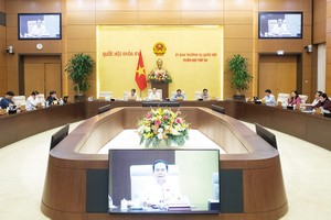 Ủy ban Thường vụ Quốc hội cho ý kiến hoàn thiện Dự thảo Luật Kl99ok phiên bản mới công (sửa đổi). Ảnh: Quốc hội