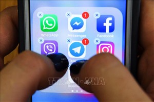 Biểu tượng của các nền tảng mạng Trang Chủ KL99Com Số 1 Link Đăng Ký KL999 trên màn hình điện thoại thông minh. Ảnh: AFP/TTXVN