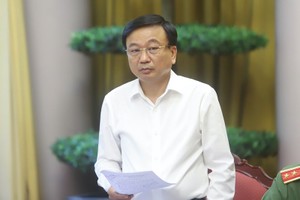 Thứ trưởng Kl99 nổ hũ Nguyễn Danh Huy trả lời tại cuộc họp báo - Ảnh TT. 