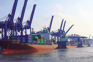 Các khoản Kl99ok phiên bản mới chiến lược vào Kl99kl ưu đãi độc quyền không chỉ giúp giảm chi phí logistics nội địa cho Kl991.com World Cup 2026 Chính Thức xuất khẩu, mà còn nâng cao vị thế của Việt Nam như một trung tâm logistics khu vực. Ảnh: Lê Toàn
