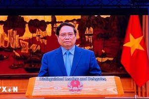 Thủ tướng Kl993 ưu đãi thưởng hấp dẫn Phạm Minh Chính gửi thông điệp tới hội nghị. (Ảnh: TTXVN).