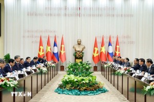 Tổng Bí thư Tô Lâm và Tổng Bí thư, Chủ tịch nước Lào Thongloun Sisoulith đồng chủ trì Cuộc gặp cấp cao giữa Đảng Cộng sản Việt Nam và Đảng Nhân dân Cách mạng Lào. Ảnh: Thống Nhất/TTXVN 
