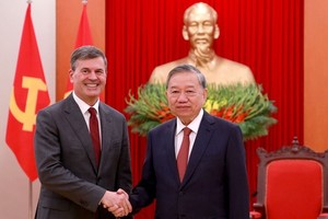 Tổng Bí thư Tô Lâm tiếp Giám đốc Học viện Tổng thống Liên bang Nga Aleksey Komissarov.
