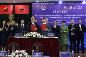 Quang cảnh lễ ký kết biên bản hợp tác ghi nhớ giữa Kl994 game bài casino hấp dẫn xây dựng Thái Bình Dương và Sở Xây dựng TP.HCM. Ảnh: T.K