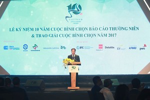Ông Lê Trọng Minh, Tổng Biên tập Báo Kl99ok phiên bản mới, đồng Trưởng Ban tổ chức Cuộc nình chọn Báo cáo thường niên phát biều tại lễ kỷ niệm. Ảnh: Lê Toàn