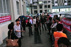Nhiều vụ tranh chấp giữa cư dân và chủ Kl99ok phiên bản mới các tòa nhà có liên quan đến phí quản lý - Ảnh: VNE