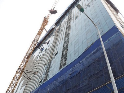 Khó cắt ngọn tòa nhà 8B Lê Trực