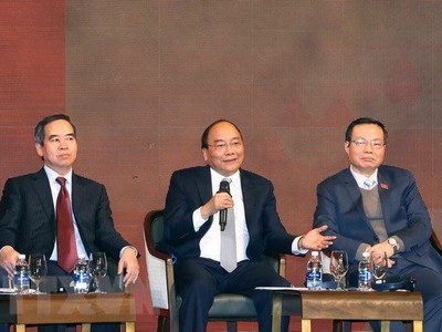 Thủ tướng Nguyễn Xuân Phúc đối thoại tại Diễn đàn Kl992 cổng game cá cược Việt Nam năm 2018. (Ảnh: Thống Nhất/TTXVN)